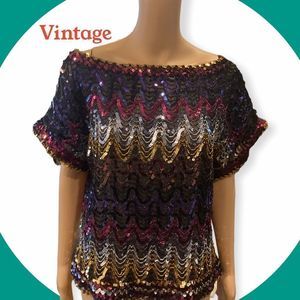 Vintage slightly see-through sequin blouse in burgundy, purple, gold, and silver